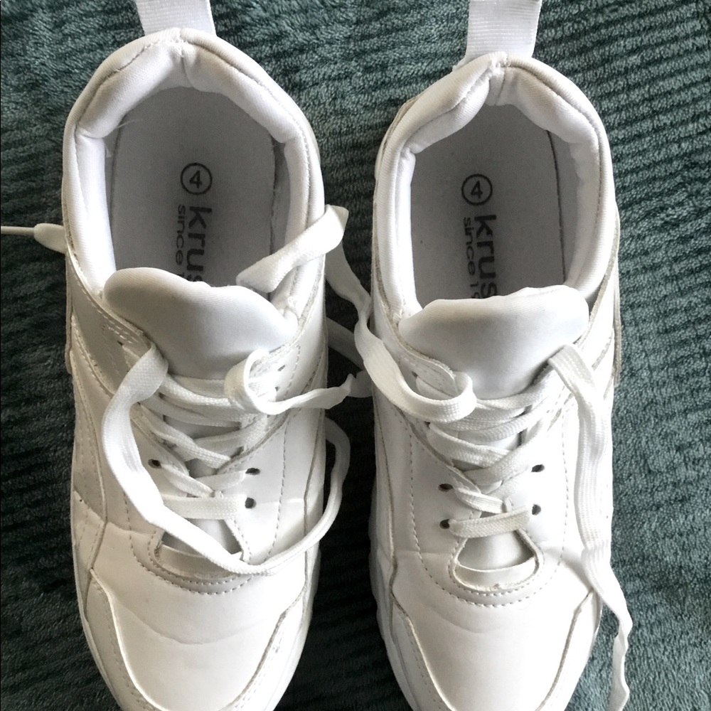 Womens size 4 sneakers, will fit a woman who wears 5.5
